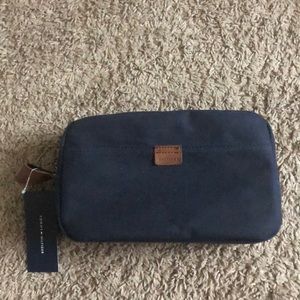 New with tags tommy hilfiger travel kit.